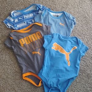 NWOT 4 pack Puma sporty onesie 0-3 months